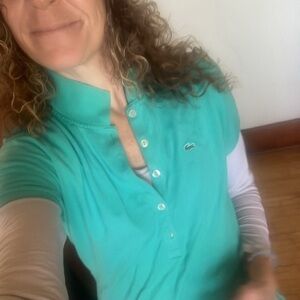 Lacoste size 42 fits a smalll light green polo.